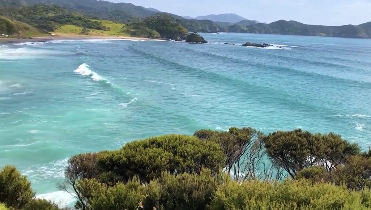 Looking out across the bay from the headland, Elliot Bay surf spot, Northland East, New Zealand.