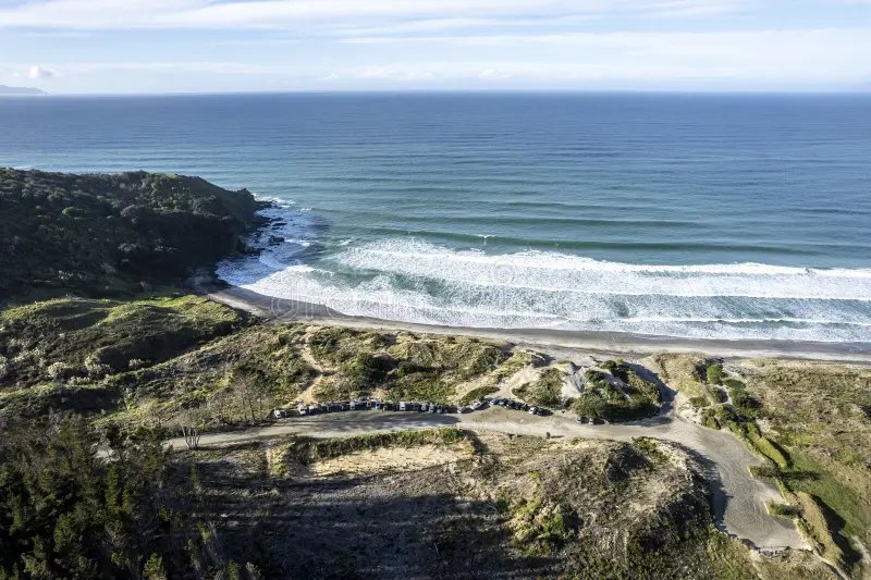 Looking down at the Forestry carpark and headland, Forestry surf spot, Auckland / Rodney, New Zealand.