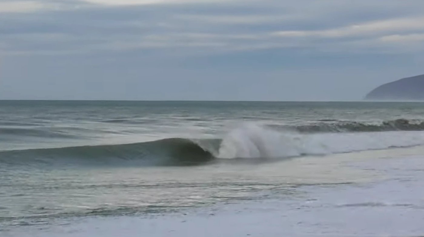 Surfing at Onoke / Lake Ferry, Onoke / Lake Ferry surf spot, Wellington / Wairarapa, New Zealand.