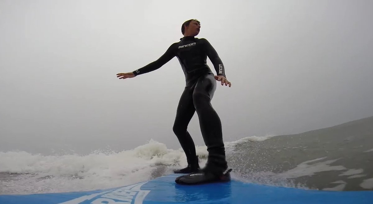 Cross-stepping on a soft grey day, mellow longboard heaven at the west end of the bay, Ruby Bay surf spot, Marlborough / Nels